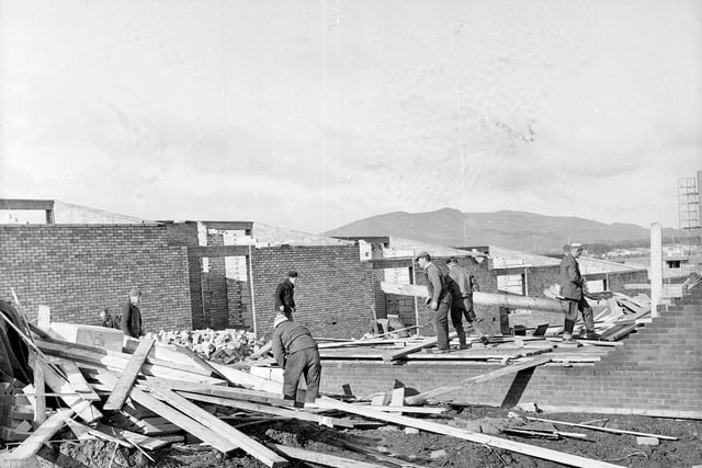 Workmen clear wreckage at Hyvots Bank in 1964 following gales in Edinburgh.