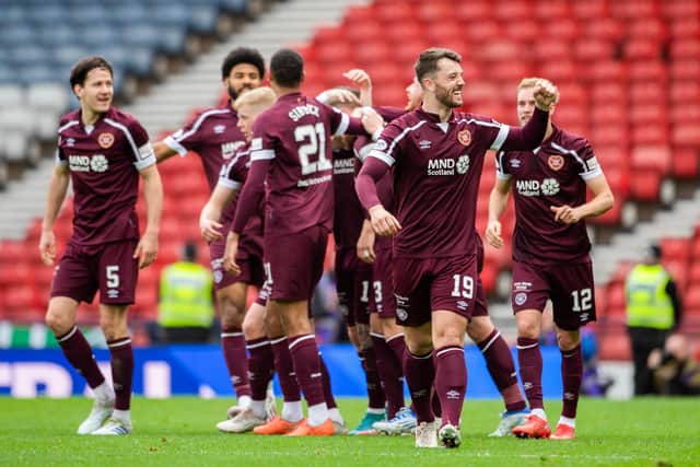 The Hearts players celebrate after Stephen Kingsley scored to make it 2-0 in the all-Edinburgh Scottish Cup semi. Picture: SNS