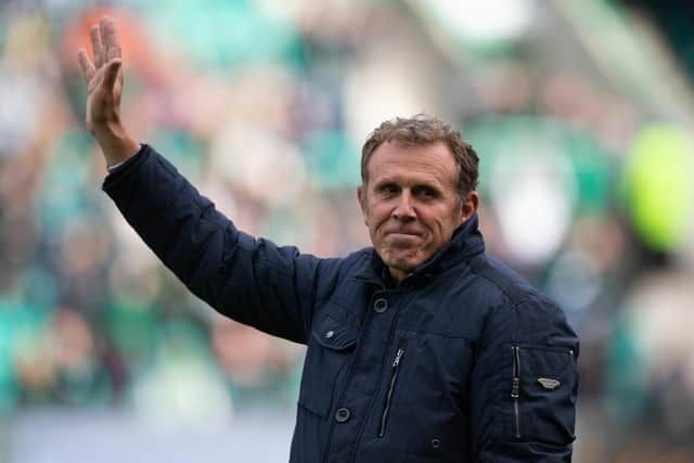Hibs legend Franck Sauzee waves to the crowd on his return to Easter Road for the Hibs v Motherwell match earlier this month. Picture: Ewan Bootman / SNS