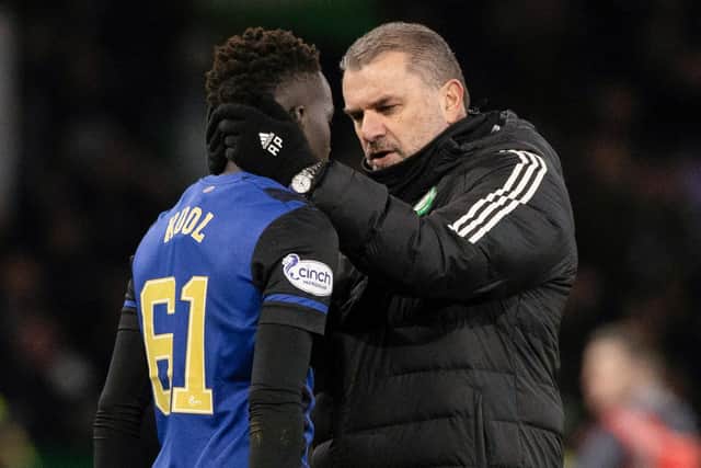 Celtic boss Ange Postecoglou speaks with Hearts attacker Garang Kuol after the recent match between the two clubs at Celtic Park. Picture: SNS