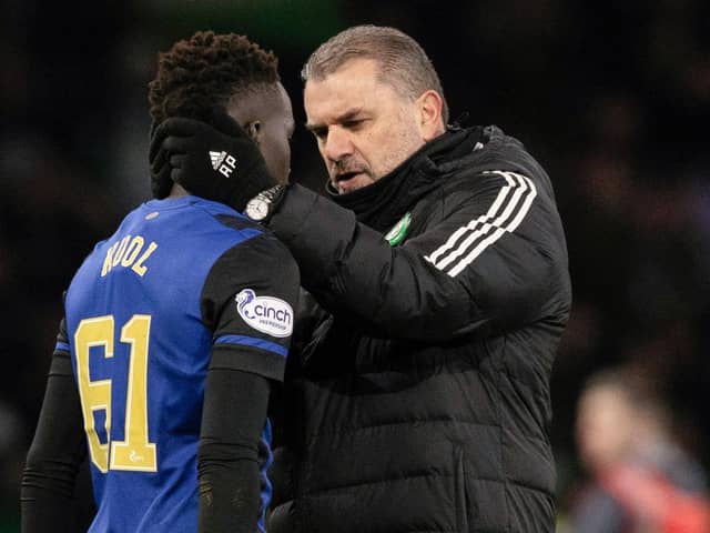 Celtic boss Ange Postecoglou speaks with Hearts attacker Garang Kuol after the recent match between the two clubs at Celtic Park. Picture: SNS