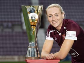 Hearts captain Mariel Kaney poses with the SWF Women's Cup ahead of Sunday's semi-final clash with Celtic at the Falkirk Stadium. Picture: SNS