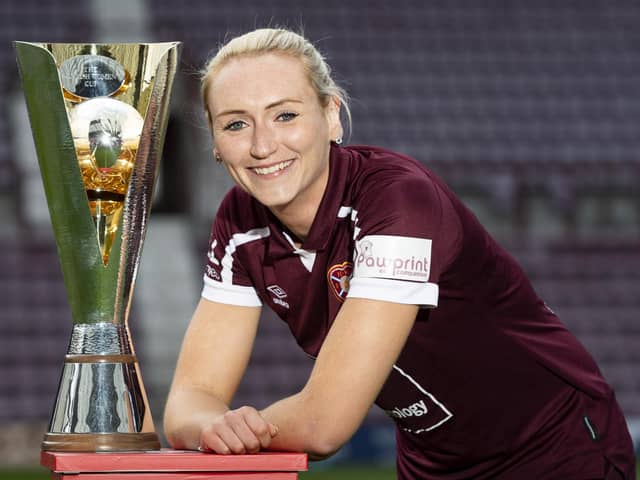 Hearts captain Mariel Kaney poses with the SWF Women's Cup ahead of Sunday's semi-final clash with Celtic at the Falkirk Stadium. Picture: SNS