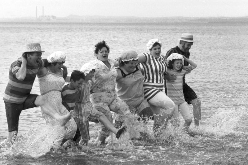 Don't be fooled by the clothing. This picture isn't from the Victorian era. In June 1989, locals dressed in historical costume for a splash in the sea during the Portobello 'Victorian Splash'.