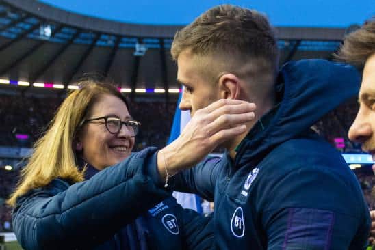 Former SRU president Dee Bradbury, who suffered a cardiac arrest in June, hugs son Magnus before the Six Nations Match between Scotland and England at BT Murrayfield in February. Picture: Gary Hutchison/SNS Group /SRU
