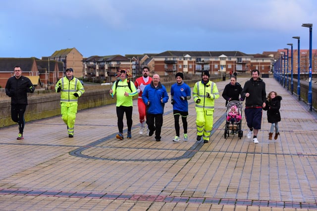 New Years Day and Paul Suggitt (3rd left) from Hartlepool starts his 10,000 miles in 365 days challenge of running, cycling or walking. Here he is on the first day helped by friends and family for the first mile.