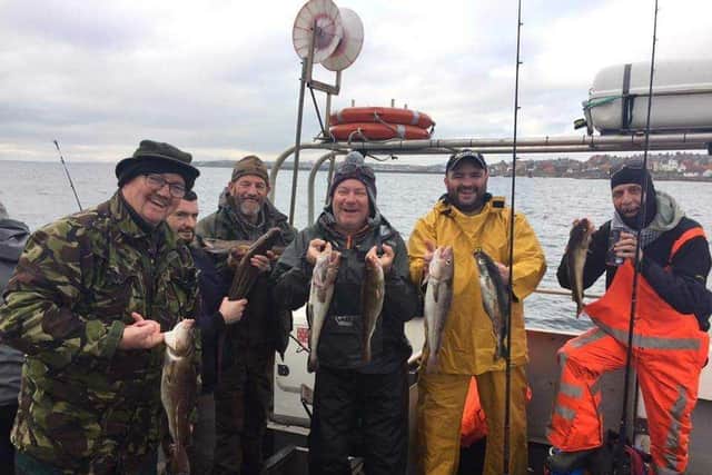 Anglers show their catches in the Forth on a East Neuk charter from Anstruther