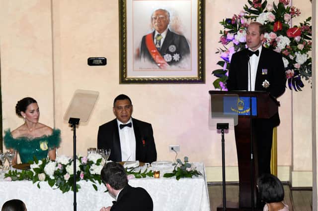 Prince William delivers a speech during a state dinner in Kingston, Jamaica as his wife Catherine and Jamaican Prime Minister Andrew Holness look on (Picture: Ricardo Makyn/AFP via Getty Images)
