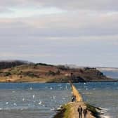 Four people were caught by the tide as they attempted to cross to Cramond Island.