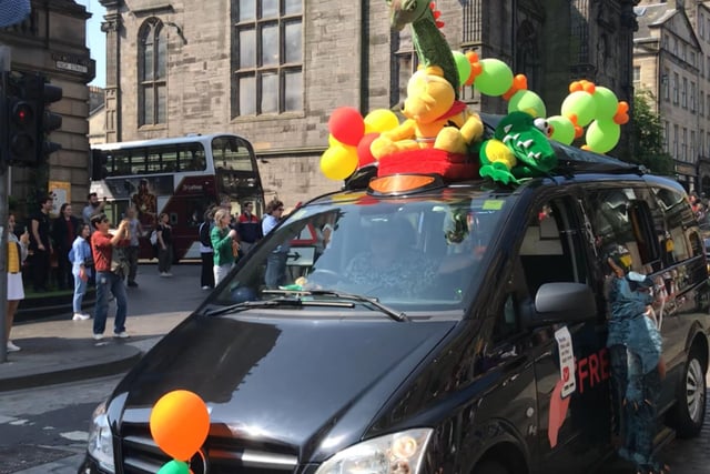 This dragon themed taxi got the crowd fired up