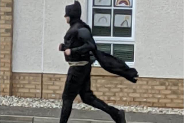 Batman running through the streets of Prestonpans