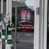 Tributes are placed outside Easter Road following the passing of Ron Gordon