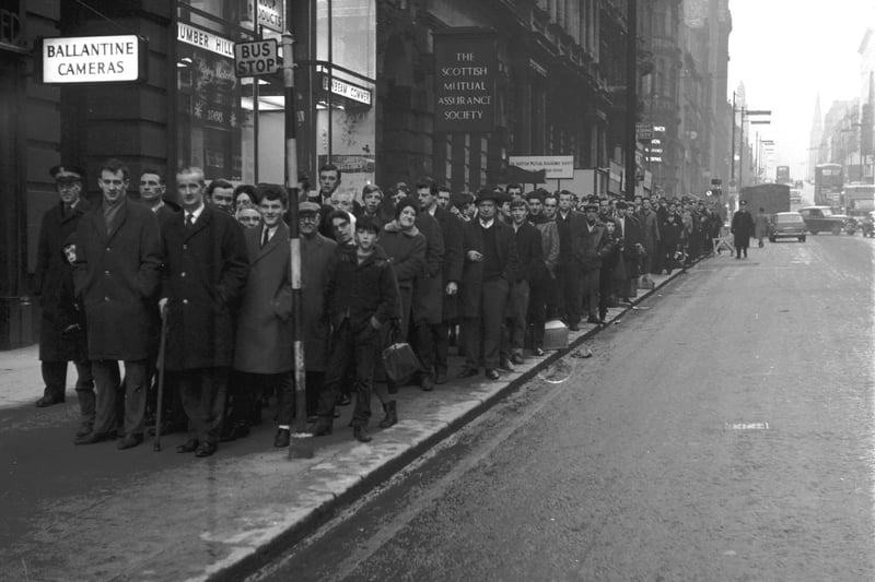 Celtic and Rangers fans queue up for tickets for the game on New Years' Day, 1965