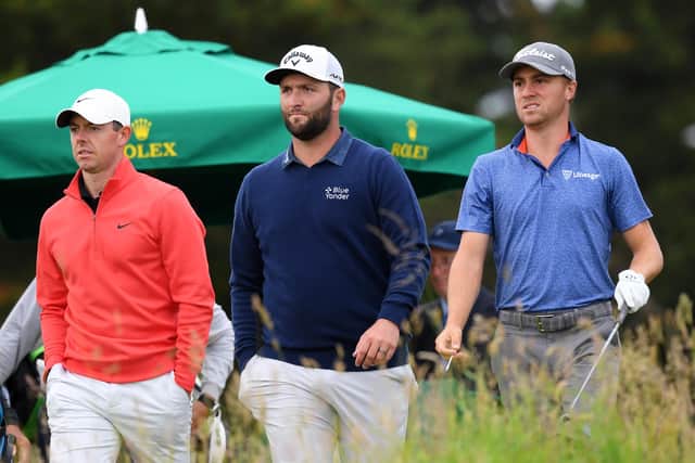 Rory McIlroy, Jon Rahm and Justin Thomas during day two of the abrdn Scottish Open. Picture: Ross Parker/SNS