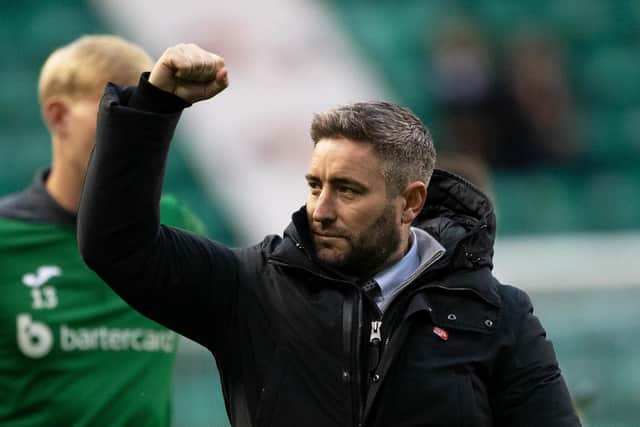 Hibs manager Lee Johnson salutes the fans after an emphatic 3-0 victory. Picture: Paul Devlin / SNS