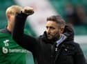 Hibs manager Lee Johnson salutes the fans after an emphatic 3-0 victory. Picture: Paul Devlin / SNS