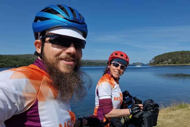 Raquel and her partner, Alejandro Dorado Martin, on their charity cycle up in the Highlands.