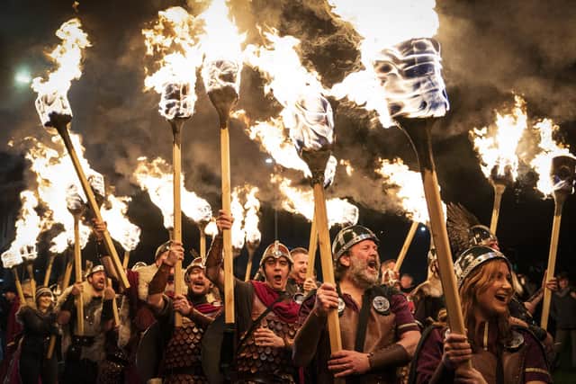 Up Helly Aa lead the torchlight procession