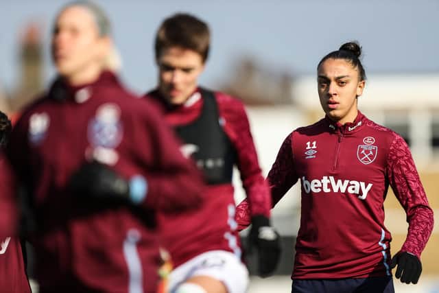 Nor Mustafa warming up with West Ham ahead of a Women's Super League match