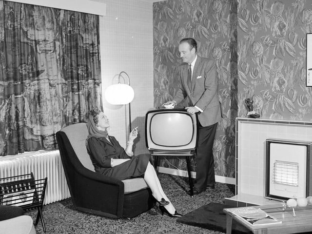 Acting stars Vanessa Lee and Peter Graves inspect a Wimpey showroom at Currie in February 1960.