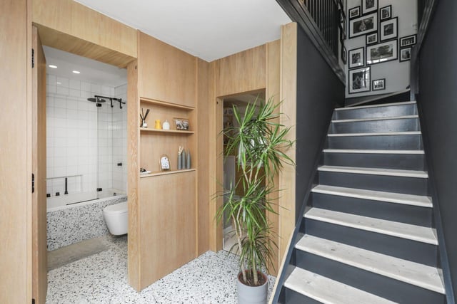 Located over two levels, the ground floor has an exceptionally bright welcoming entrance via the glazed doors and stunning terrazzo flooring with stairs leading to the upper part of the property.