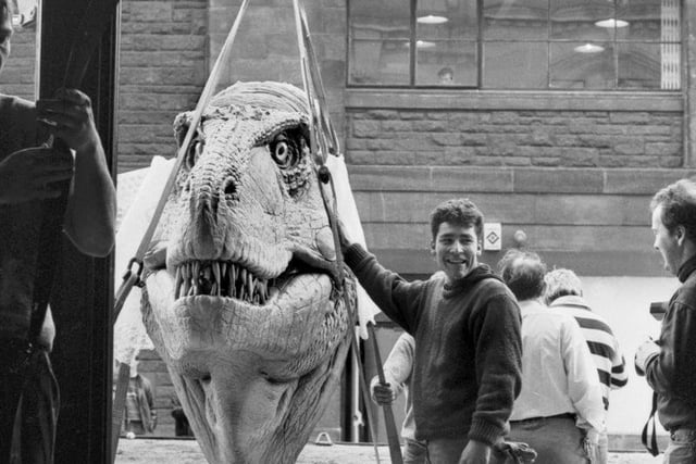Here you can see a giant Tyrannosaurus Rex head being unloaded by workmen for the Dinosaurs Alive! Exhibition at the City Art Centre in Edinburgh, February 1990.