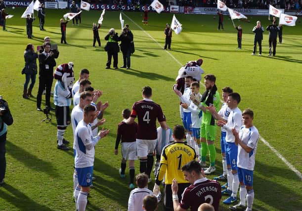 Hearts were given a guard of honour the last time they faced Queen of the South. Picture: SNS