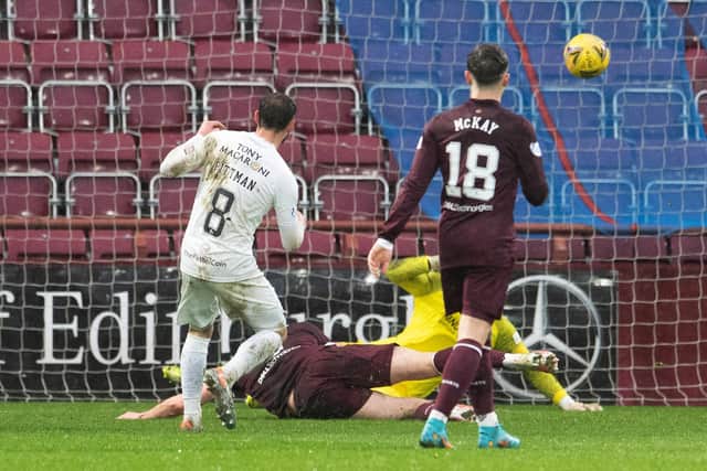 Scott Pittman goes close for Livingston as his effort is deflected beyond Hearts keeper Craig Gordon and hits the post. Picture: SNS