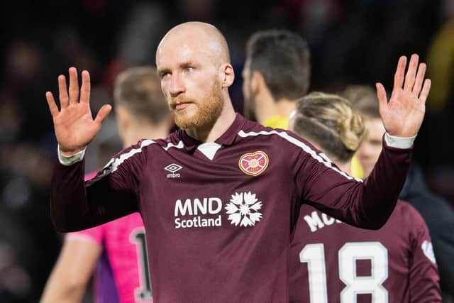 Liam Boyce apologises to the Hearts fans at full-time after his penalty miss. Picture: SNS