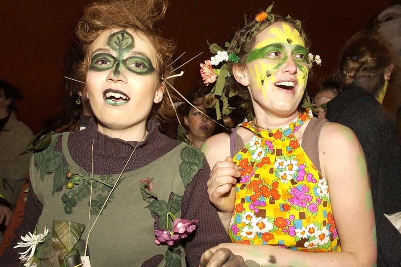 Revellers with painted faces join in the traditional Celtic celebration of summer's arrival at the Beltane festival in 2004.