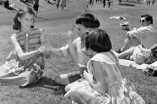 Children playing in Princes Street Gardens during a heatwave in July 1962.