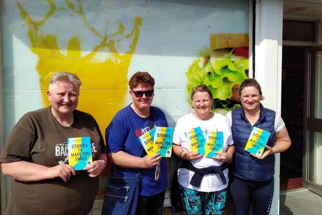 Rosewell Community Council handed out the book to locals for free. Pictured (LtoR) are Helen Blackburn, Ali Izatt, Abby Houston and Jan Halvorson.