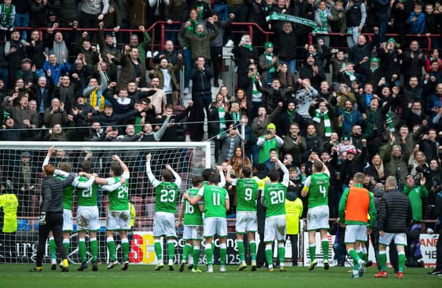Hibs fans had their say on the SPFL decision to relegate Hearts. Picture: SNS