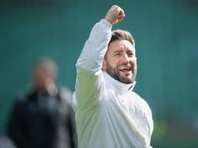 Hibs boss Lee Johnson celebrates at full time after beating Hearts