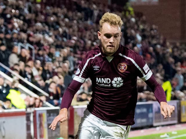 Hearts defender has been called up by Australia for the first time.