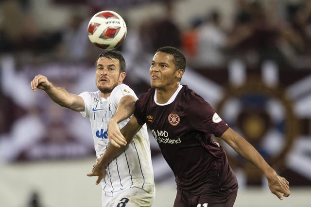 Zurich's Adrian Guerrero, left, fights for the ball with Hearts' Toby Sibbick.