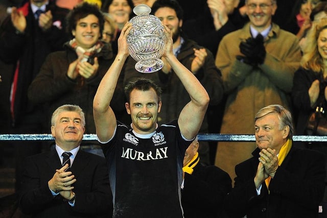 Al Killock of Scotland lifts the trophy after securing the victory in the Bank of Scotland Corporate Autumn Tests match between Scotland and Australia on 21 November, 2009.