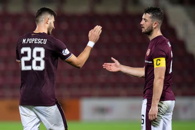 Mihai Popescu is ready to step into the Hearts defence beside Craig Halkett if asked.