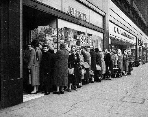Eager shoppers can be seen queuing early for the anticipated sale at Jeffreys. 24 February 1959
