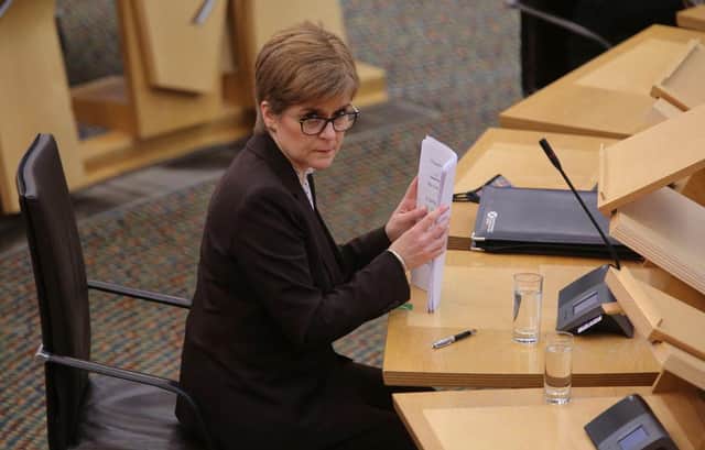 Nicola Sturgeon's new five tier system will need to pass a voted at Holyrood on October 27 (Getty Images)