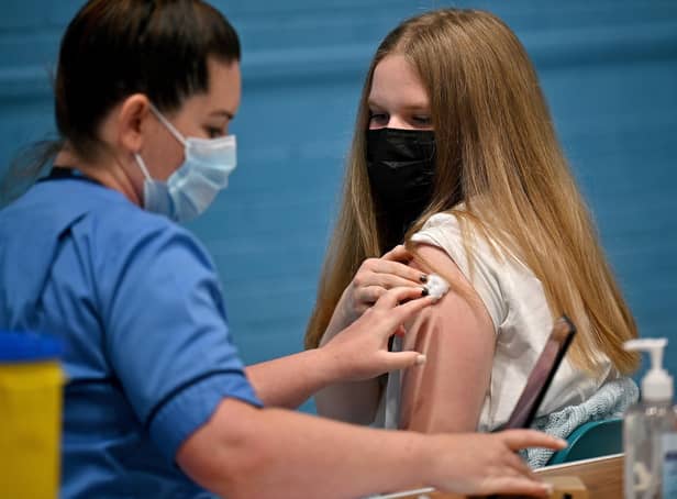 A teenager Eve receiving a Covid vaccination in Barrhead. Picture: Jeff J Mitchell/Getty Images
