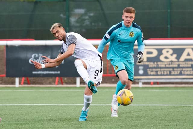 Edinburgh City's Ouzy See capitalises on a Dumbarton defensive mistake to open the scoring in the League One play-off semi-final first leg. (Photo by Mark Scates / SNS Group)