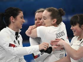 Eve Muirhead, Vicky Wright, Jen Dodds and Hailey Duff celebrate after Britain won the women's curling gold medal by defeating Japan 10-3 in the final