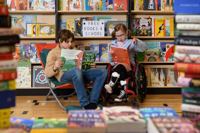 Ivor and Oona Dooks enjoying their free books courtesy of this year’s Edinburgh International Book Festival Baillie Gifford Schools Programme. (Picture credit: Ian Georgeson)