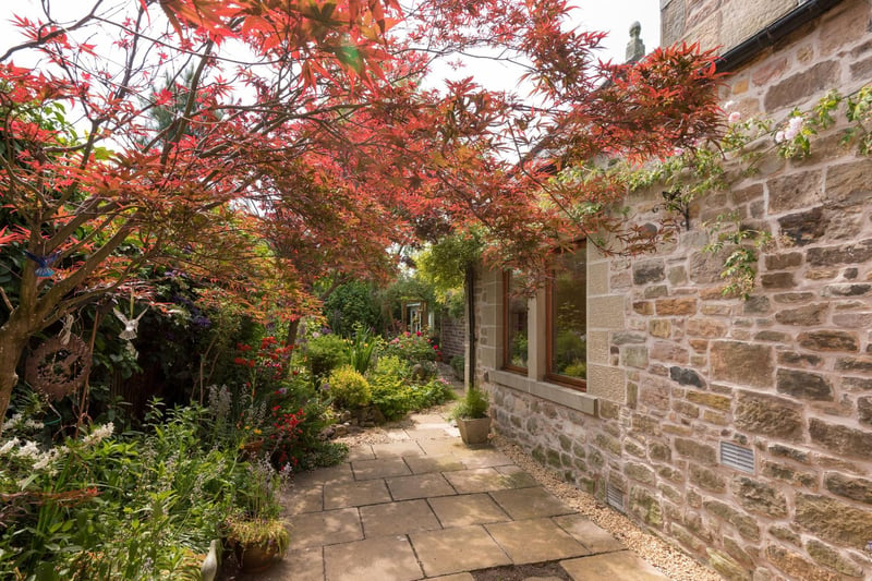 This property is a semi-detached stone-built home which retains many original features.