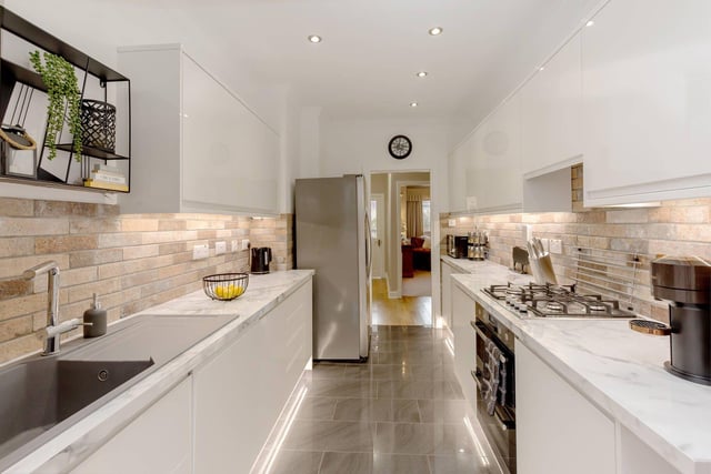 The Barnton property's superb recently fitted kitchen with integrated appliances.