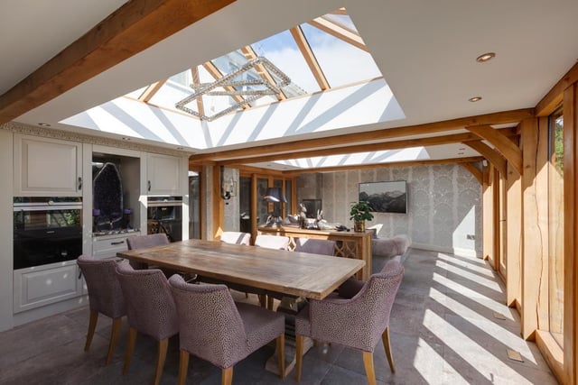 The open plan dining and sitting room is bright and airy thanks to the oak framed roof lantern with double glazed panels, and offers plenty of room for both family and guests.