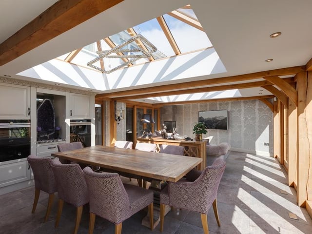The open plan dining and sitting room is bright and airy thanks to the oak framed roof lantern with double glazed panels, and offers plenty of room for both family and guests.