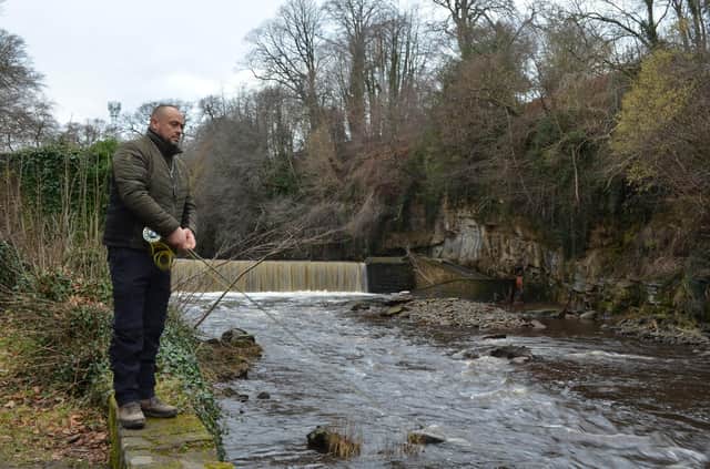 Adam Cross makes the first cast to officially open the season on The Almond at Cramond. Picture Nigel Duncan