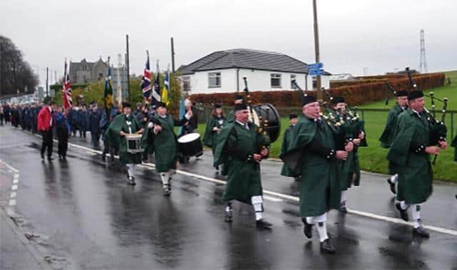 Colinton and Currie Pipe Band leading the Armistice Day Parade in Kirknewton 2010 (Photo:  Courtesy of Piping Press and Mr Alistair Aitken OBE).